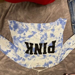 long sleeved top from PINK, blue and white tie dye with black lettering